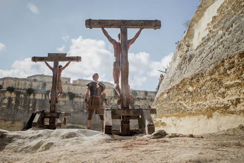 Jesus crucified along with two convicted criminals in RISEN, in theaters nationwide, Feb. 19, 2016. Photo: Columbia Pictures
