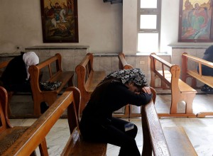 Displaced Assyrians, who had fled their hometowns due to Islamic State Group (IS) attacks against their communities, take part in a prayer at the Ibrahim-al Khalil Melkite Greek Catholic church in the Jaramana district on the outskirts of the capital Damascus on March 1, 2015. IS jihadists in Syria recently abducted at least 220 Assyrians, one the world's oldest Christian groups. Some 30,000 Assyrians lived in Syria before the start of the civil war in 2011.